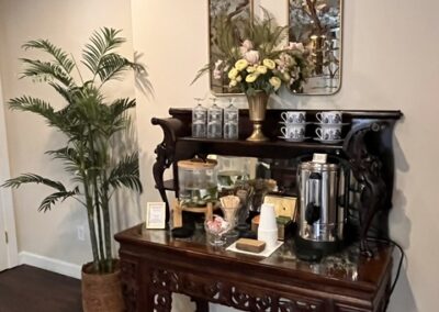 Refreshment station in lobby at Well Into Life Massage and Skincare